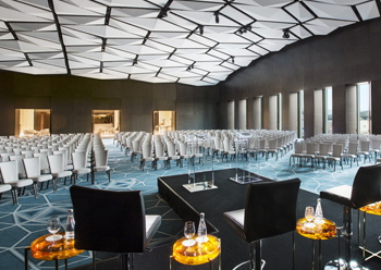 Al Mirqab Ballroom features broadly arched ceiling of reinforced plaster in a faceted, geometric pattern.