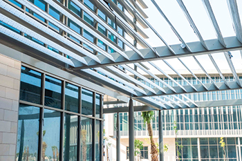 Academic buildings have horizontal and vertical sunshade louvres for energy efficiency.