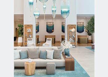 The light colour palette is a base for the marina-influenced turquoise hues.