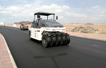 Dynapac rollers ... at work on a road project.