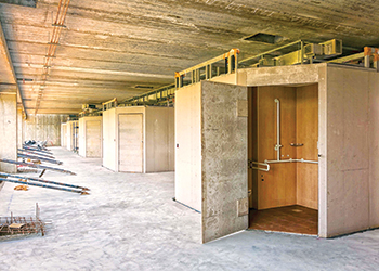 Under construction ... modular toilets inside the PMHP Hospital in India.