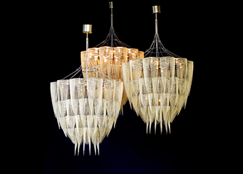 Protea ... pays homage to the national flower of South Africa with multiple tiers and a chain.