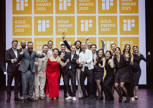 Hansgrohe officials celebrate the design achievements.