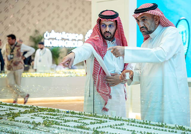 Visitors at ROSHN’s stand at Cityscape Global.