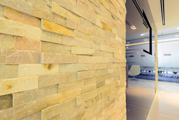 The stone wall feature in the reception area.