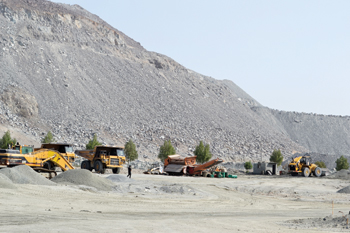 A rebuilt quarry truck at a work site.