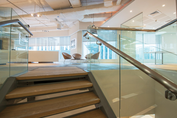 The American White Oak staircase … connects the various sections of the head office building.