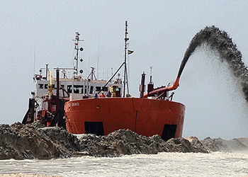 UDC ... work on an Umm Al Quwain jetty.