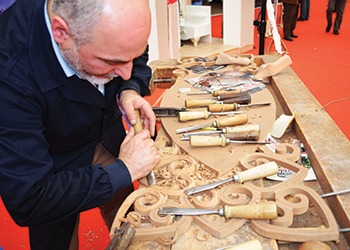 A craftsman at work at a previous edition of Modef Expo.