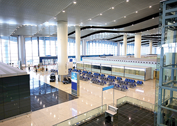 Terminal Five... features 60 check-in desks and 20 self-service machines.