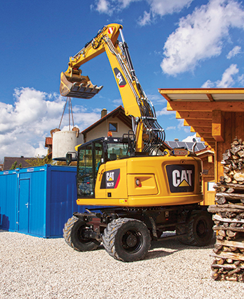 New arrival ... the M317F wheeled excavator (right).